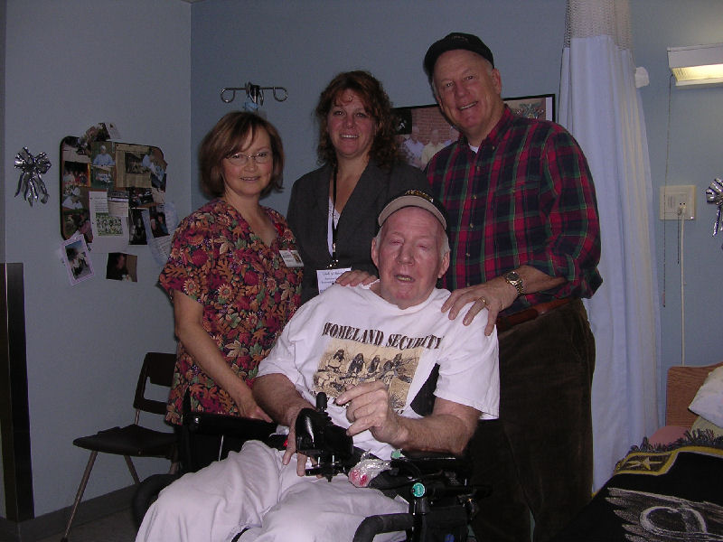 Tim with caregivers, Lorain his nurse, Lindey activities director and Rollie his buddy.jpg