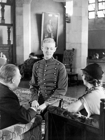 In Grant Reception Hall parents chat with their soldier sons till bugles sound dress parade, West Point, 1936.<br /><br />
