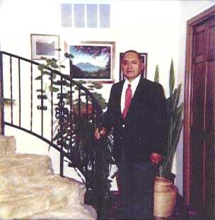 Jose Andres "Andy" Chacon standing on stairway.