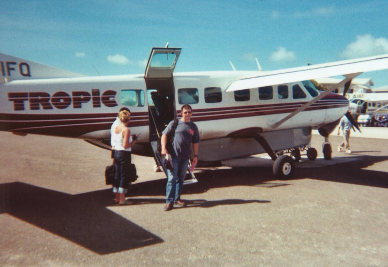 Kris getting off arrival aircraft